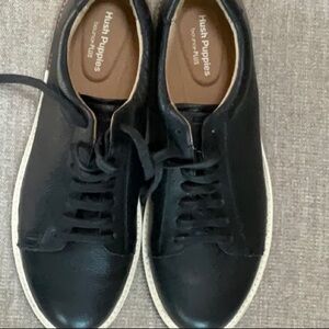 Brand new, never worn Black Leather Hush Puppies.